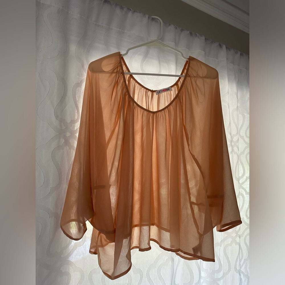 Orange/peachy top